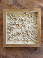 Rustic plaster blossom wall decor
